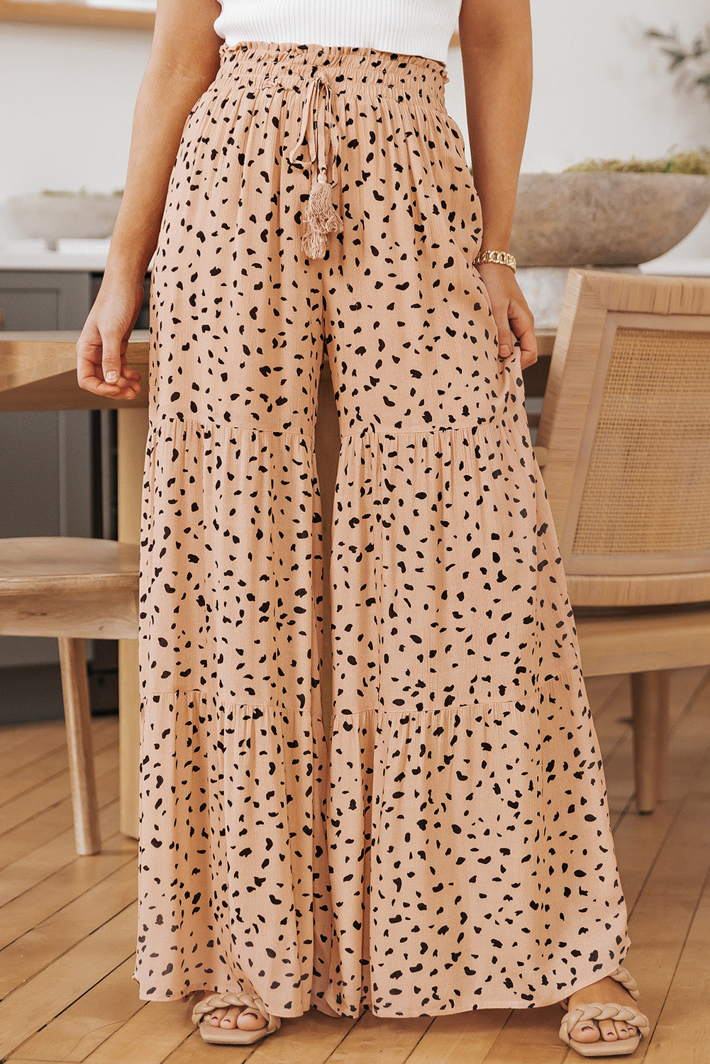 Printed wide tiered pants with drawstring, casual chic style.