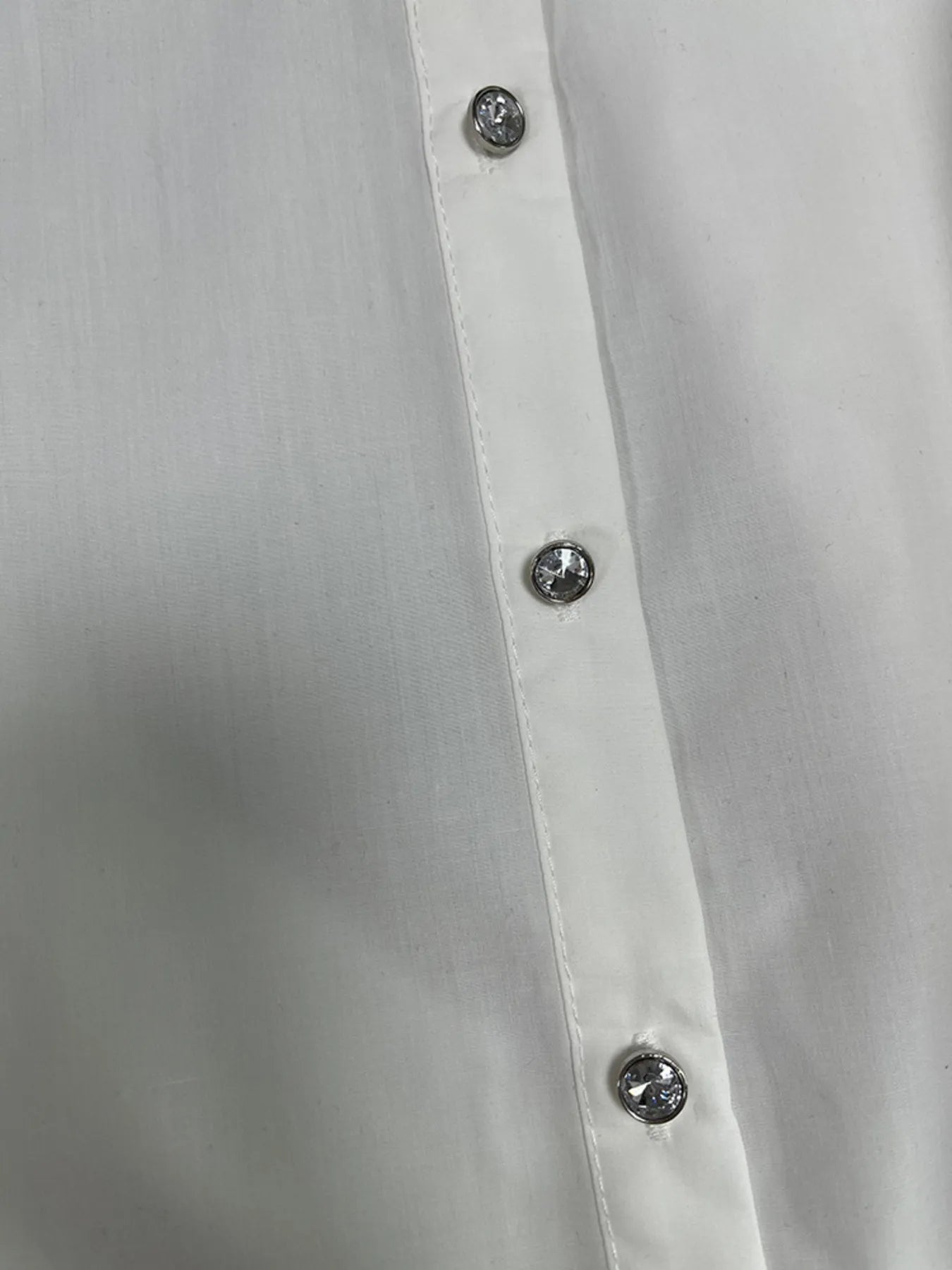 Puff Sleeve Button-Up Shirt with Rhinestone Detail.
