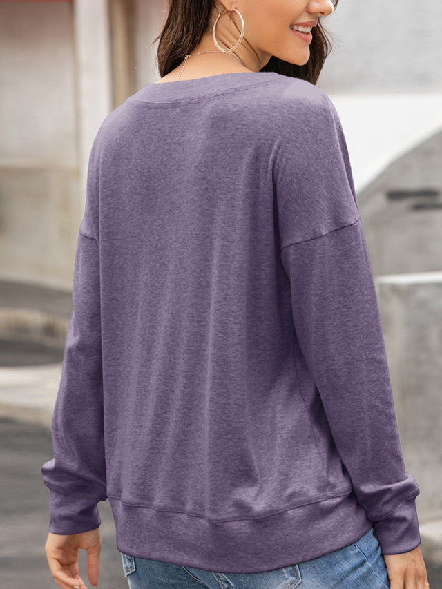 Ivy Lane Quarter Button Dropped Shoulder Blouse.