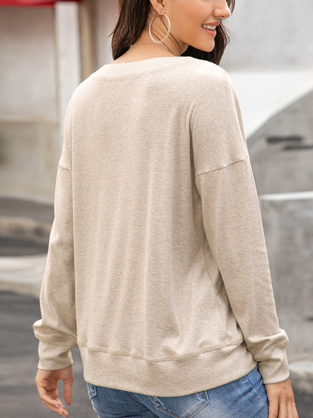 Ivy Lane Quarter Button Dropped Shoulder Blouse.