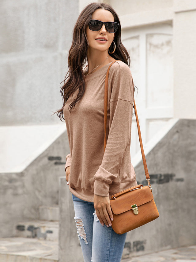 Ivy Lane Quarter Button Dropped Shoulder Blouse.