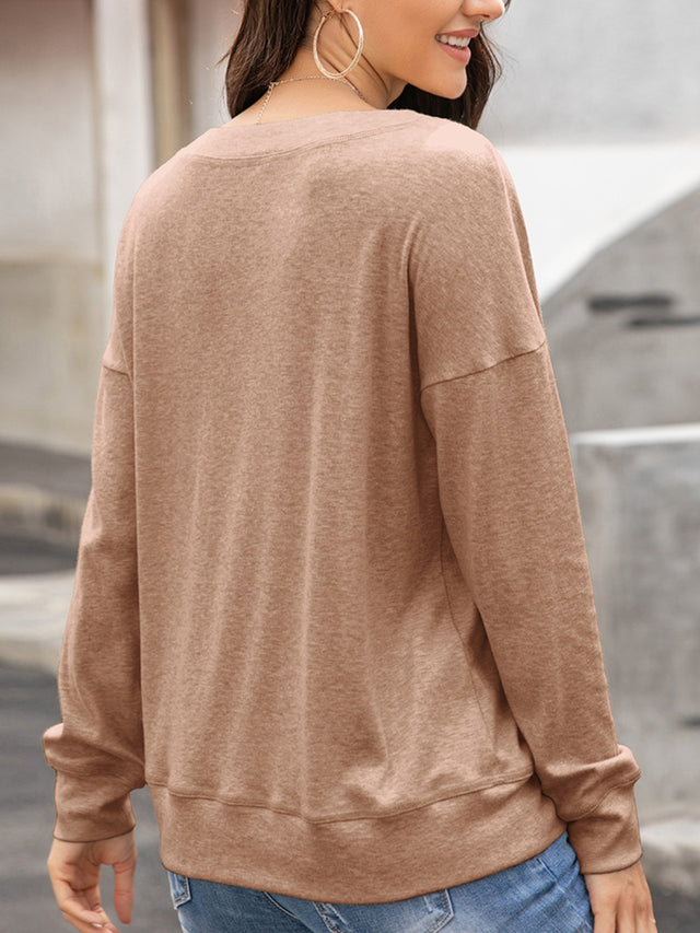 Ivy Lane Quarter Button Dropped Shoulder Blouse.