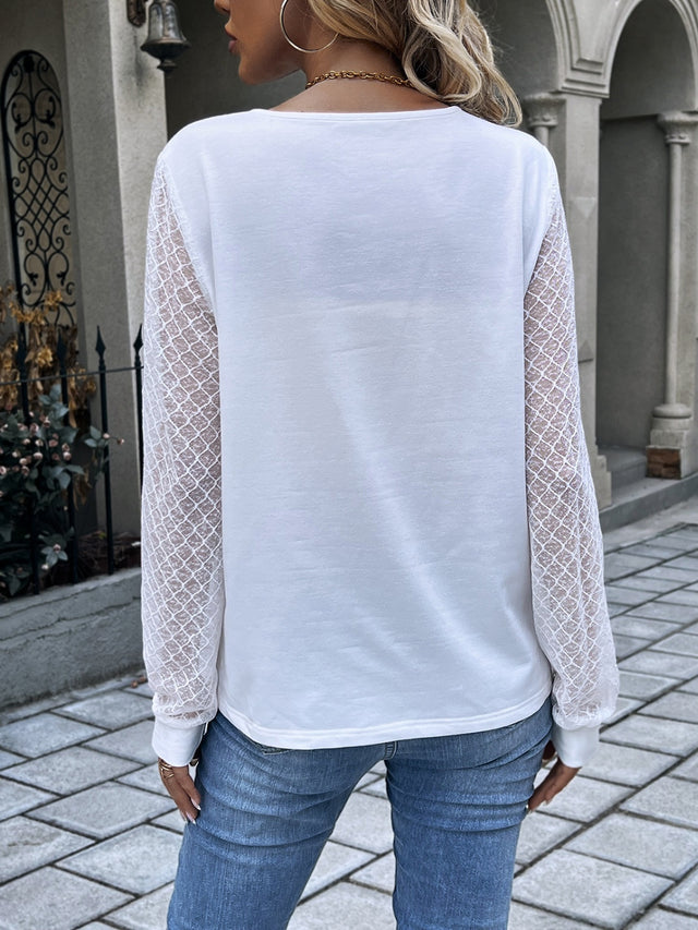 Ivy Lane Quarter Button Round Neck Long Sleeve Blouse.