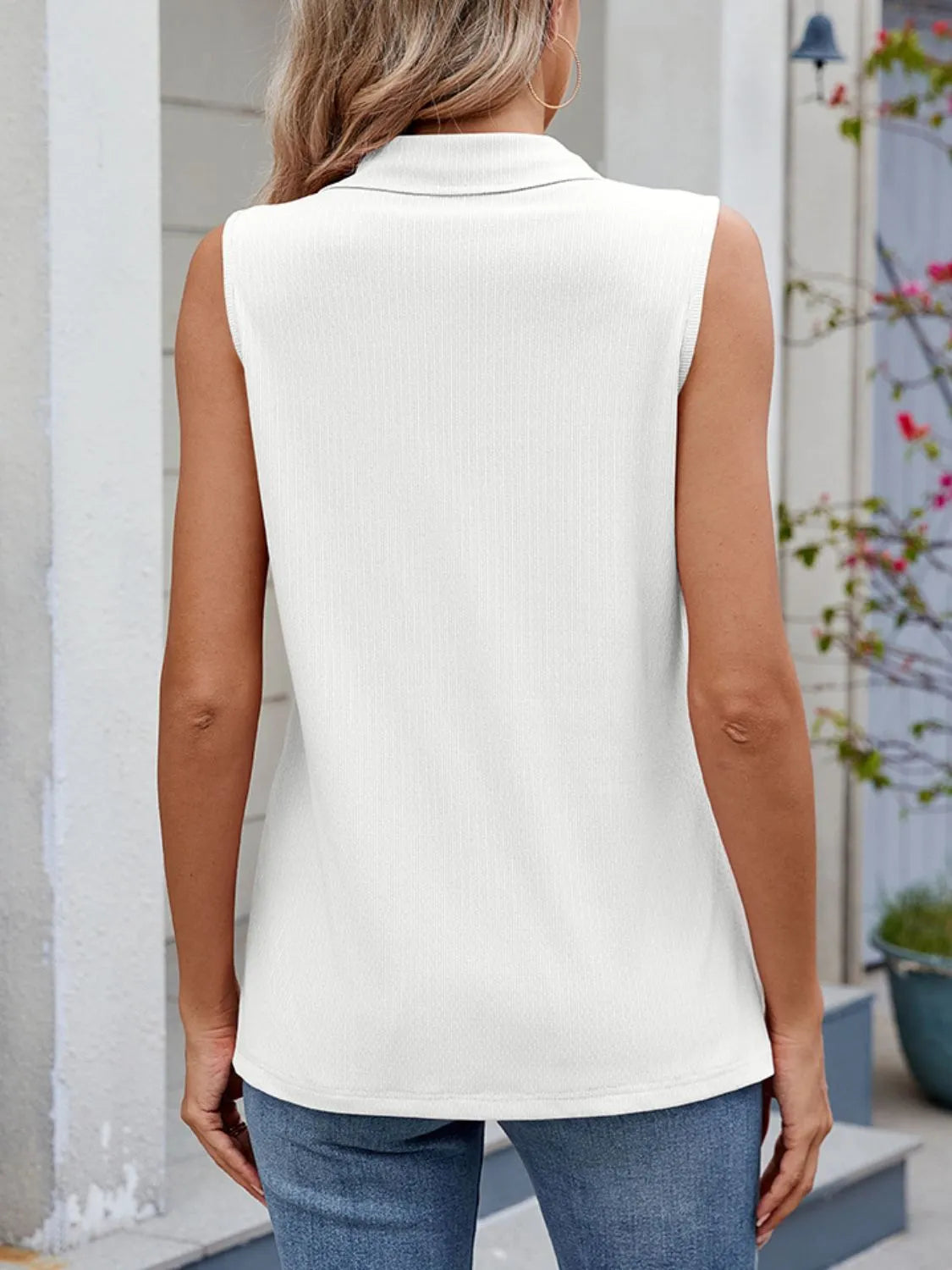 Quarter zip collared tank top.