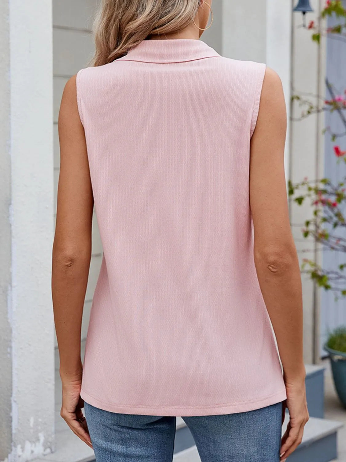 Quarter zip collared tank top.