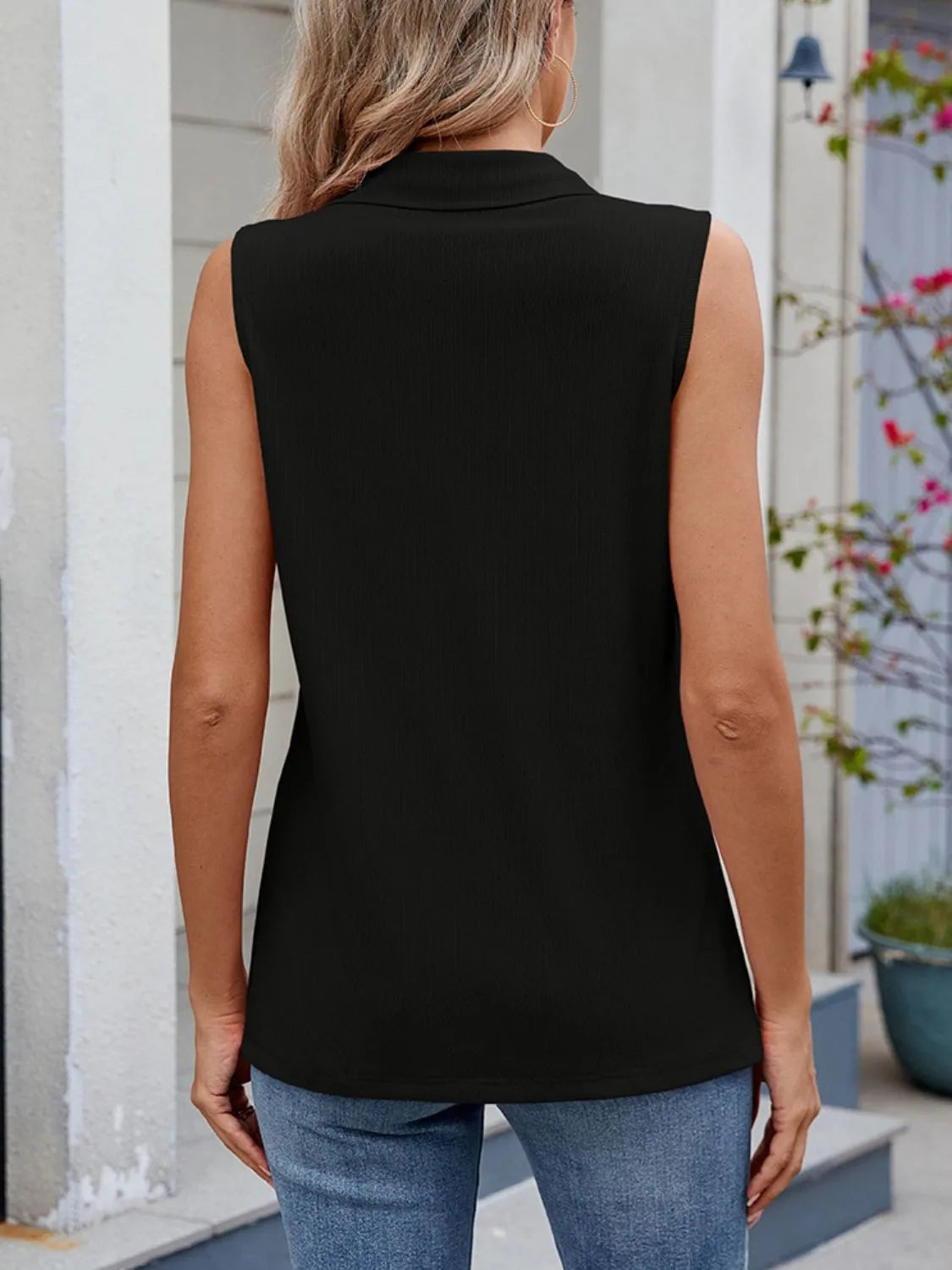 Quarter zip collared tank top.
