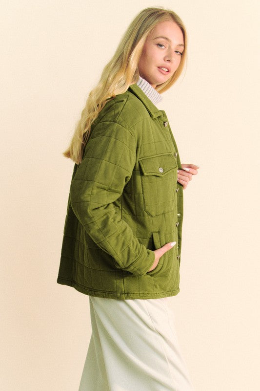 Quilted button down shacket with chest pockets.