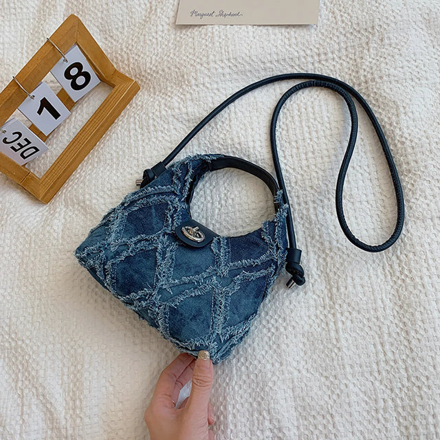 Small quilted raw hem mini crossbody bag.