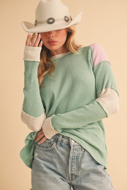 Aemi Co Raw Seam Color Block Round Neck Knit Top.