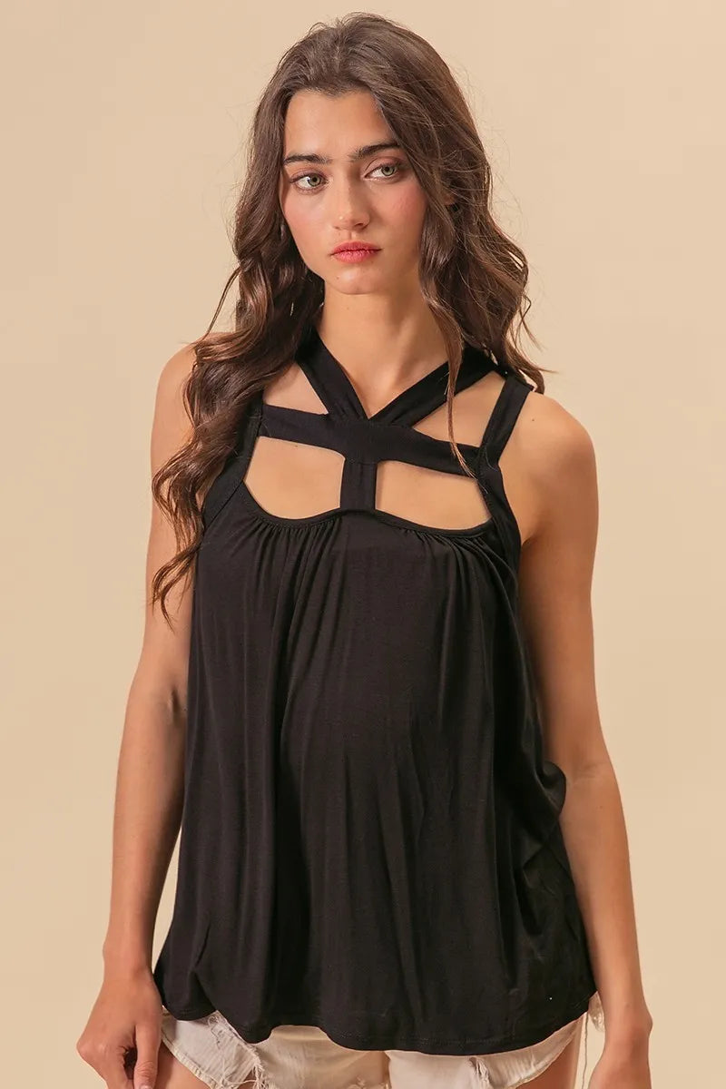 Rayon span jersey cut out top with straps and pockets, slightly stretchy.