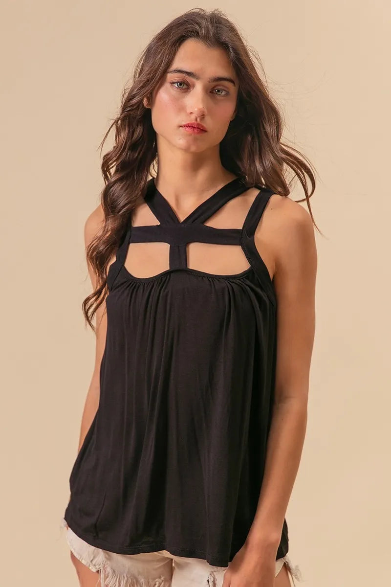 Rayon span jersey cut out top with straps and pockets, slightly stretchy.