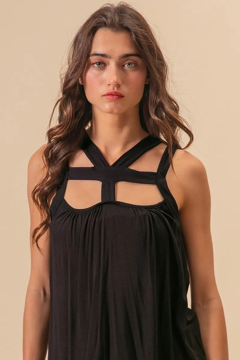 Rayon span jersey cut out top with straps and pockets, slightly stretchy.