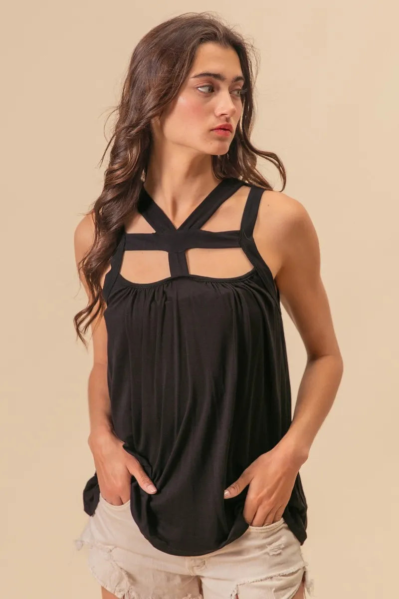 Rayon span jersey cut out top with straps and pockets, slightly stretchy.