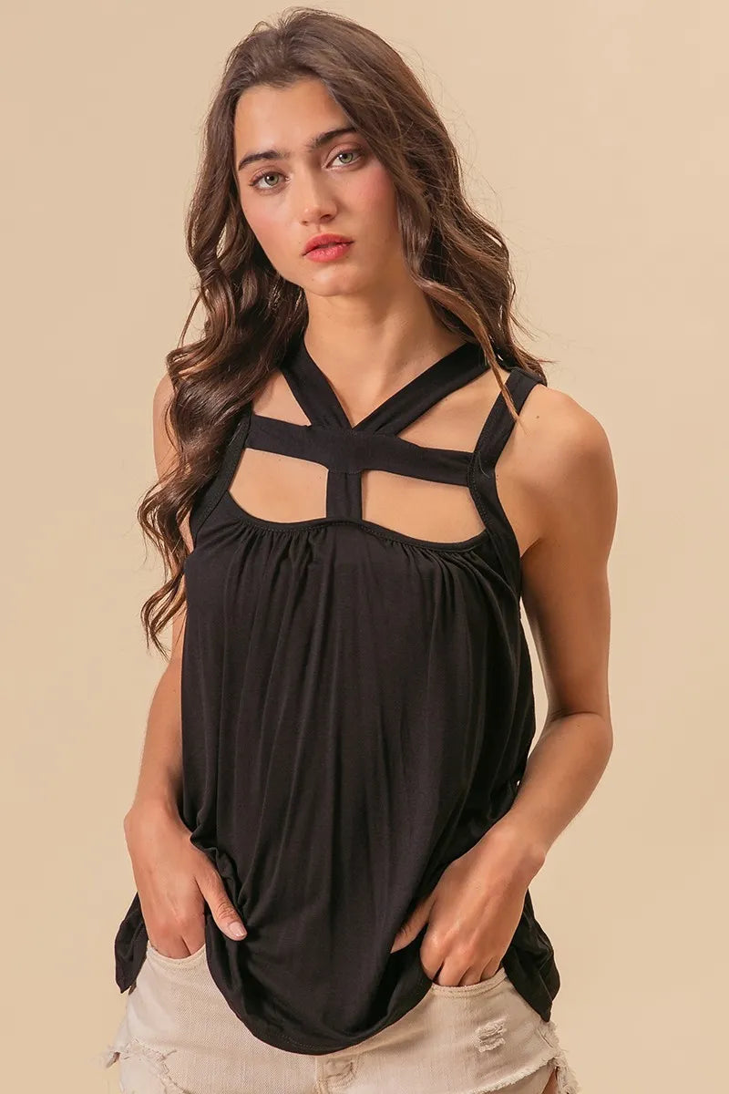 Rayon span jersey cut out top with straps and pockets, slightly stretchy.