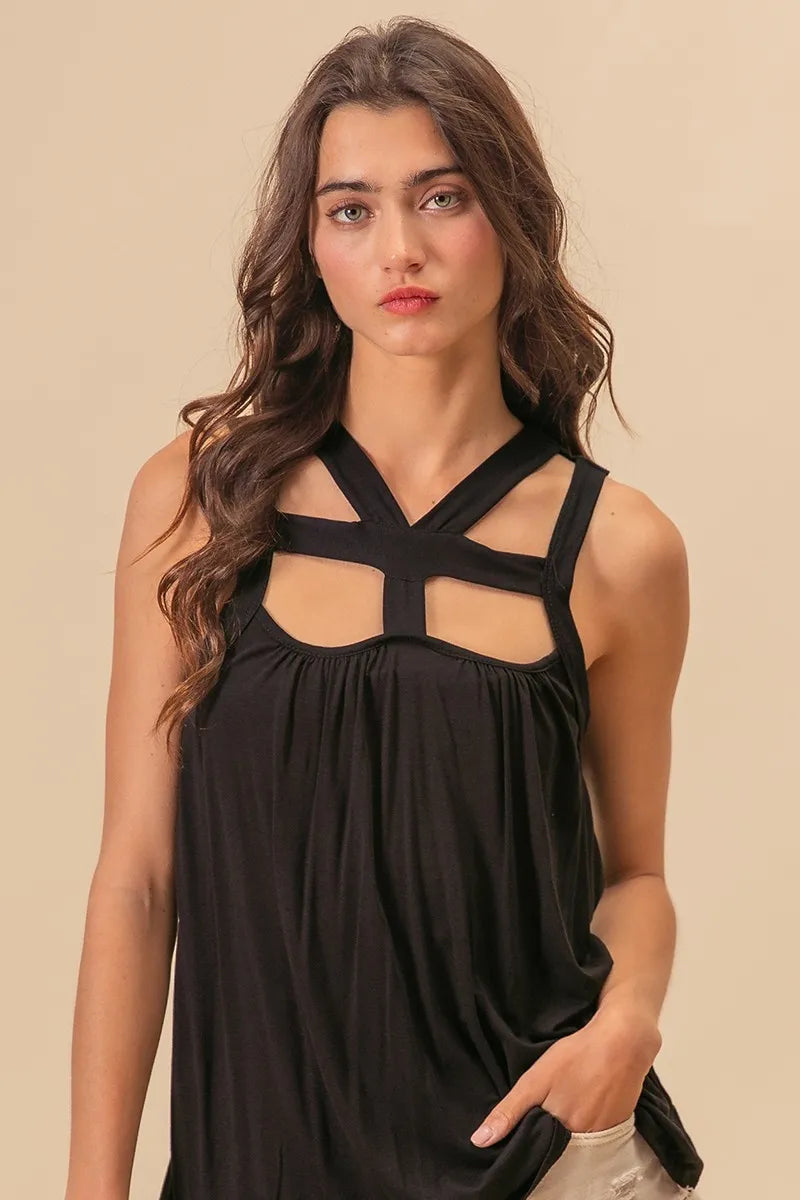 Rayon span jersey cut out top with straps and pockets, slightly stretchy.