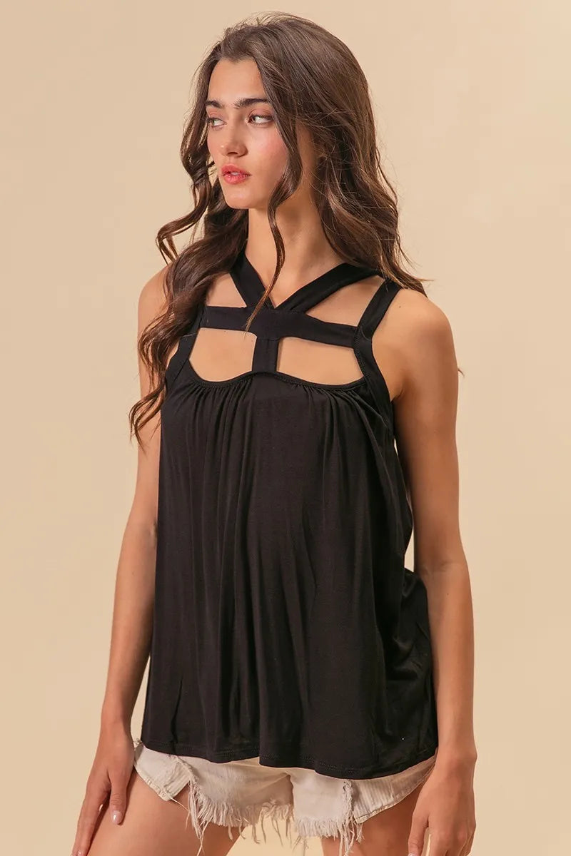 Rayon span jersey cut out top with straps and pockets, slightly stretchy.