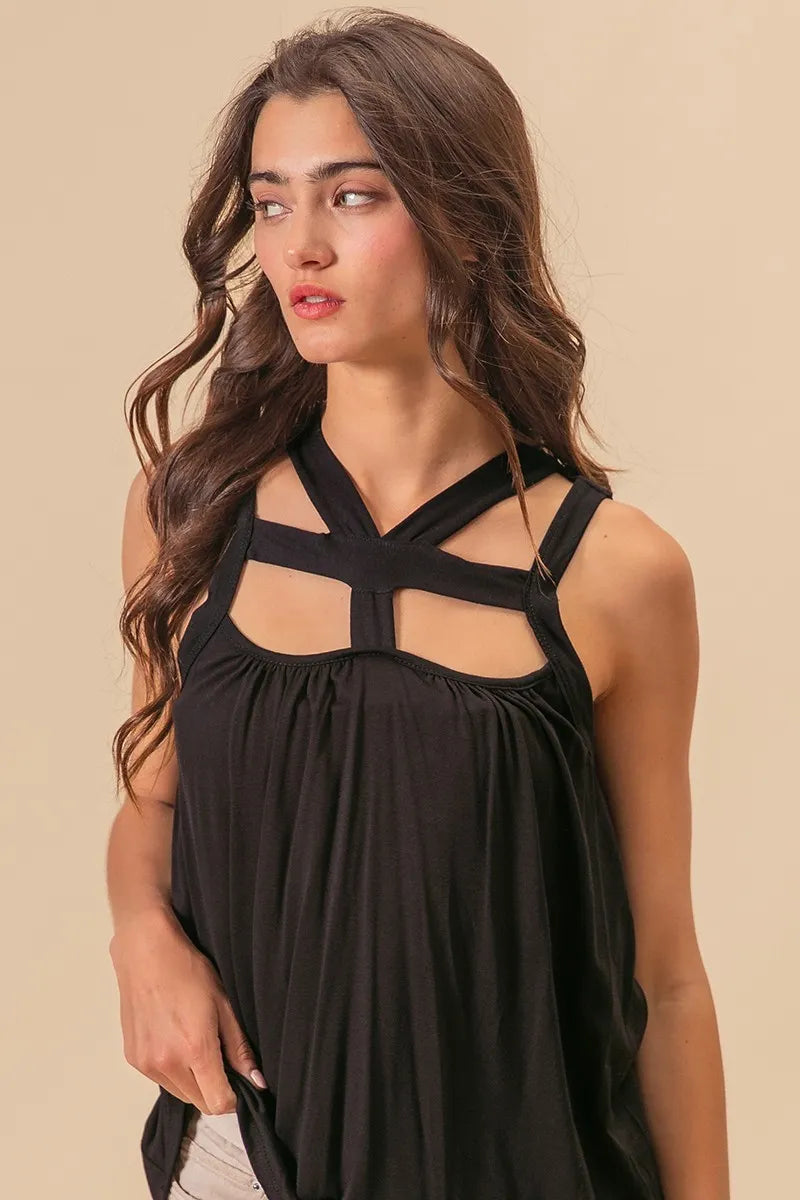 Rayon span jersey cut out top with straps and pockets, slightly stretchy.