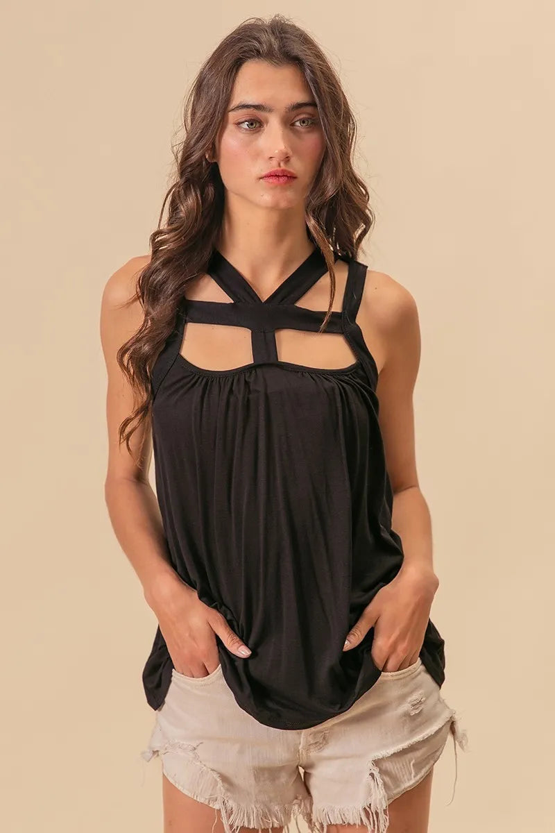 Rayon span jersey cut out top with straps and pockets, slightly stretchy.
