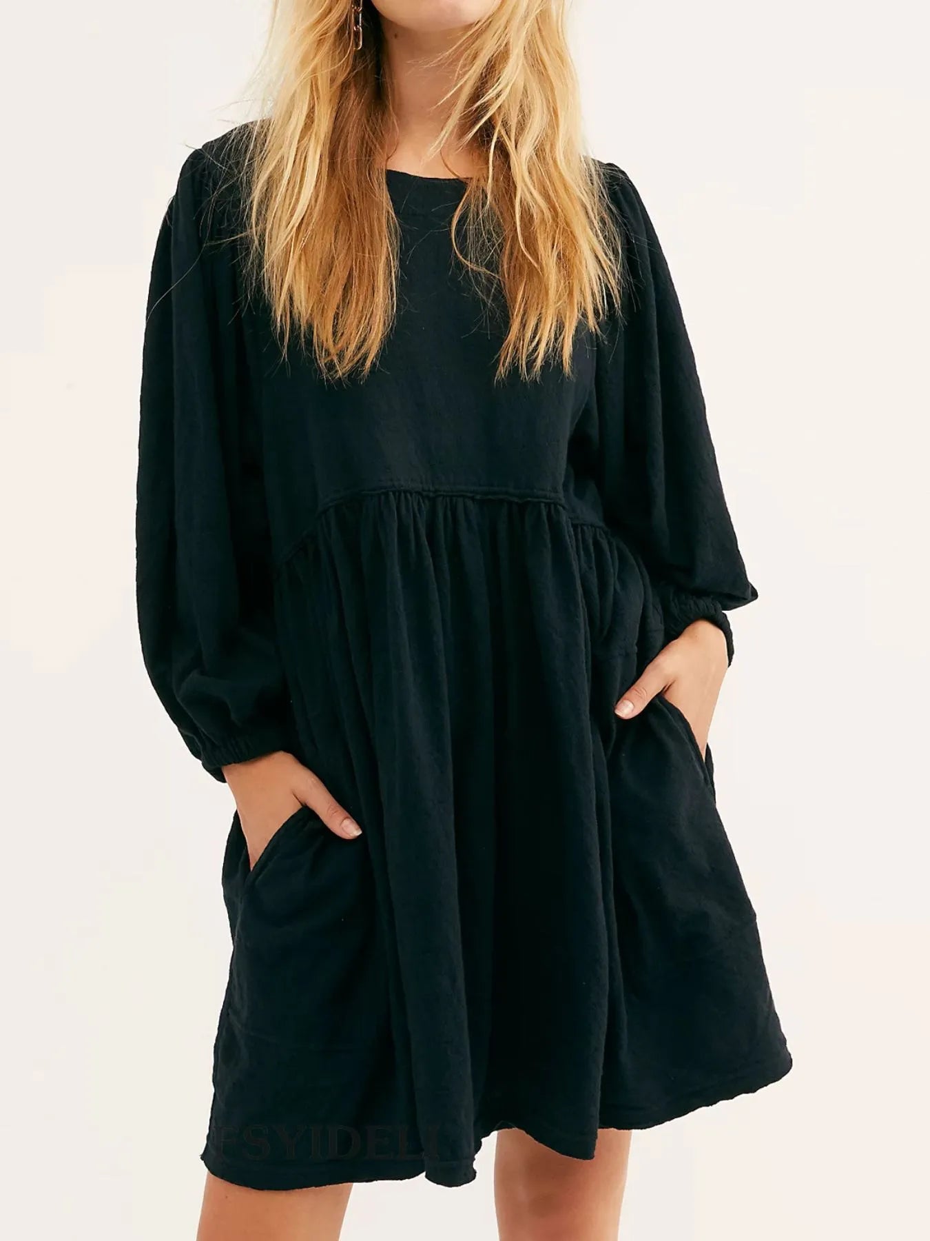 Relaxed Textured Babydoll Mini Dress with Back Keyhole Detail.