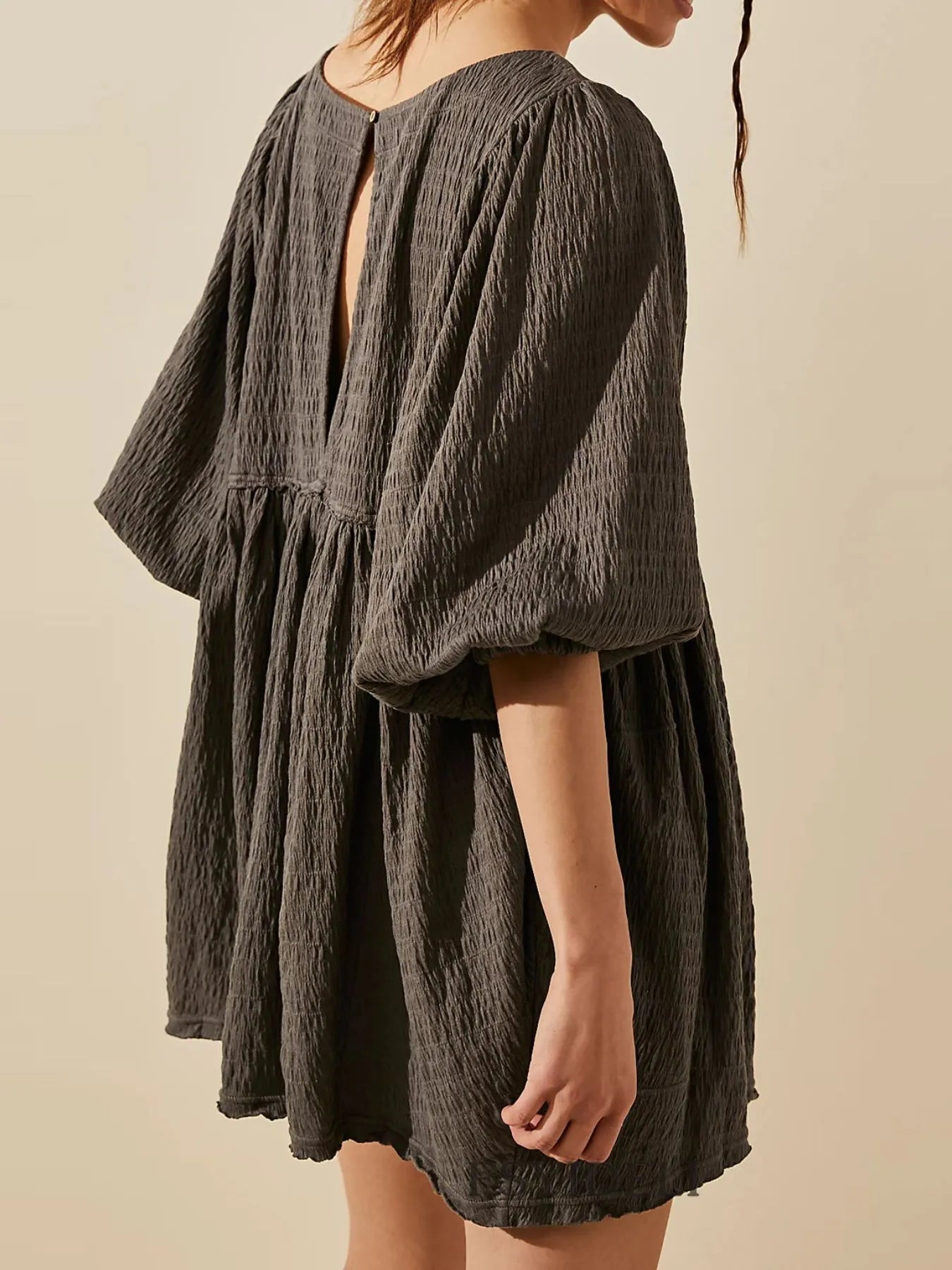 Relaxed Textured Babydoll Mini Dress with Back Keyhole Detail.