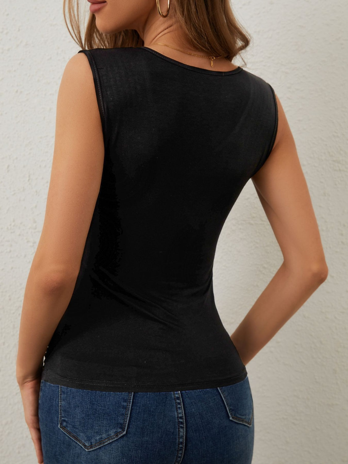 Rhinestone detail surplice tank top.
