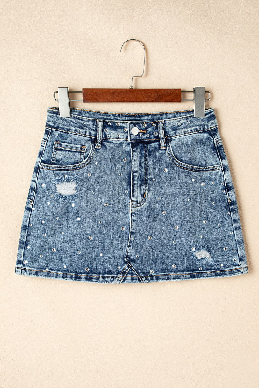 Rhinestone Distressed Denim Mini Skirt.