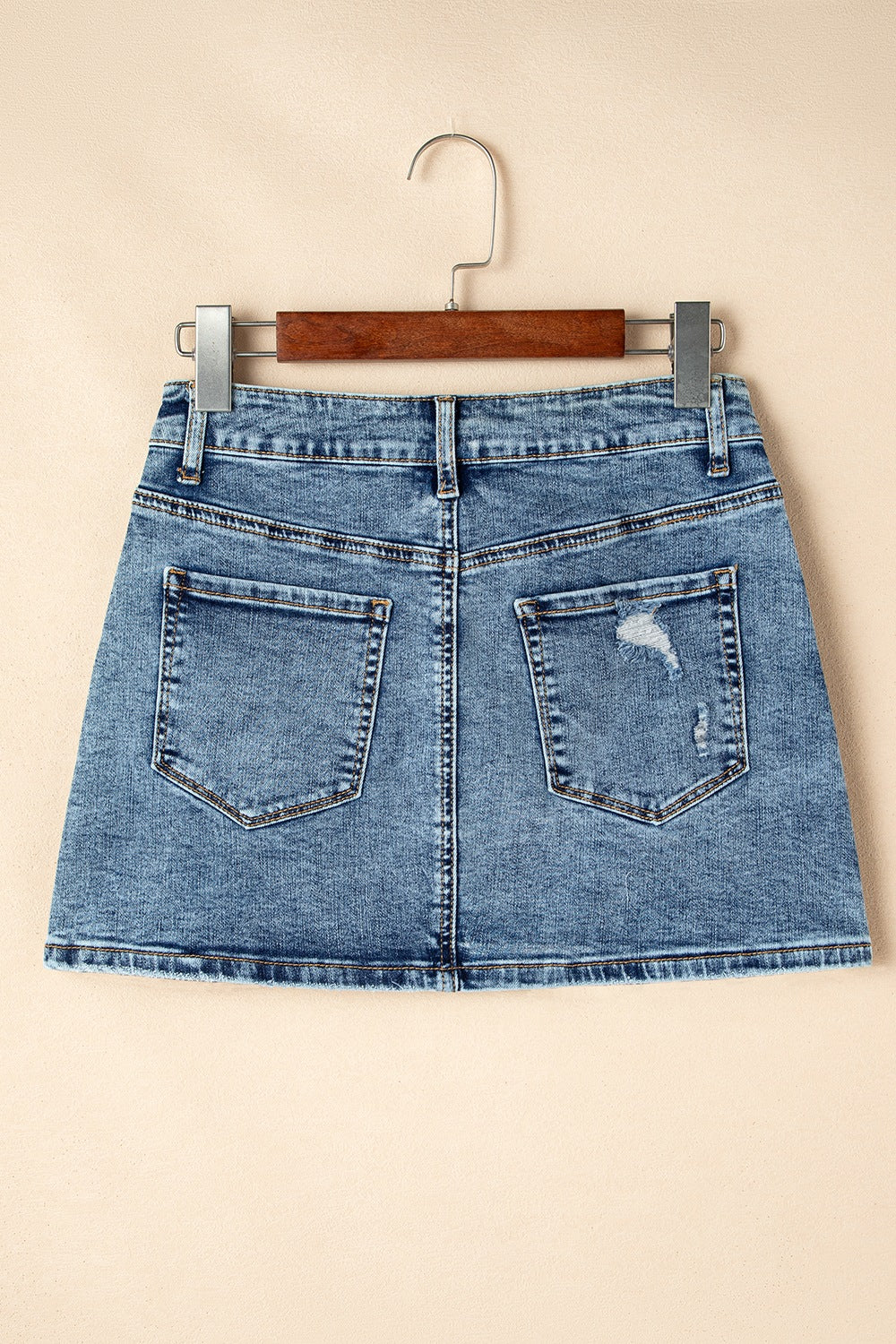 Rhinestone Distressed Denim Mini Skirt.