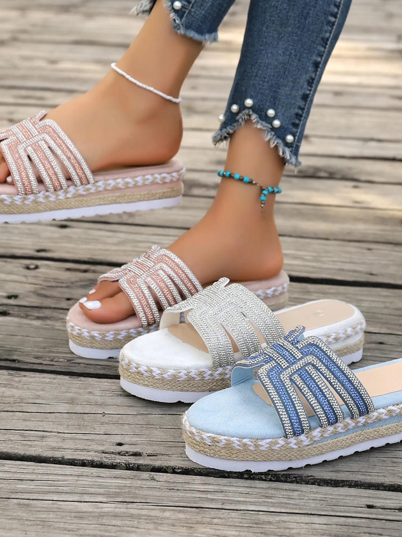 Rhinestone embellished flat platform espadrille sandals.