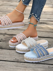 Rhinestone embellished flat platform espadrille sandals.