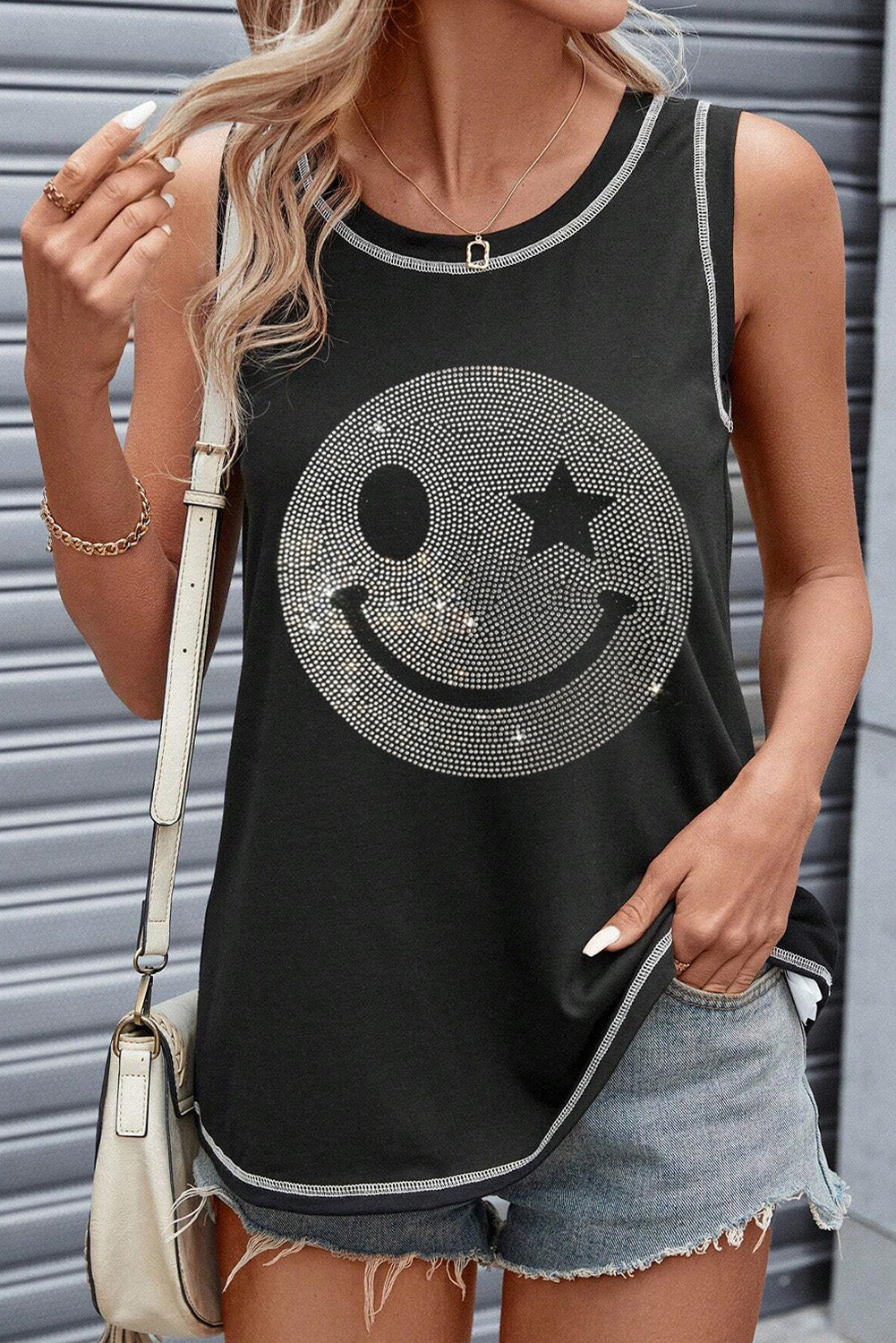 Rhinestone smile face round neck tank, opaque and slightly stretchy.