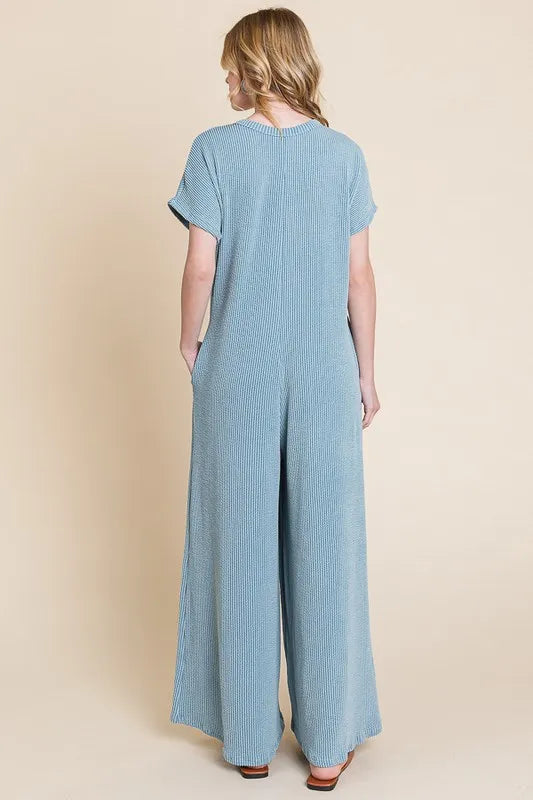 Rib Knit Jumpsuit with Button Detail and Pockets.