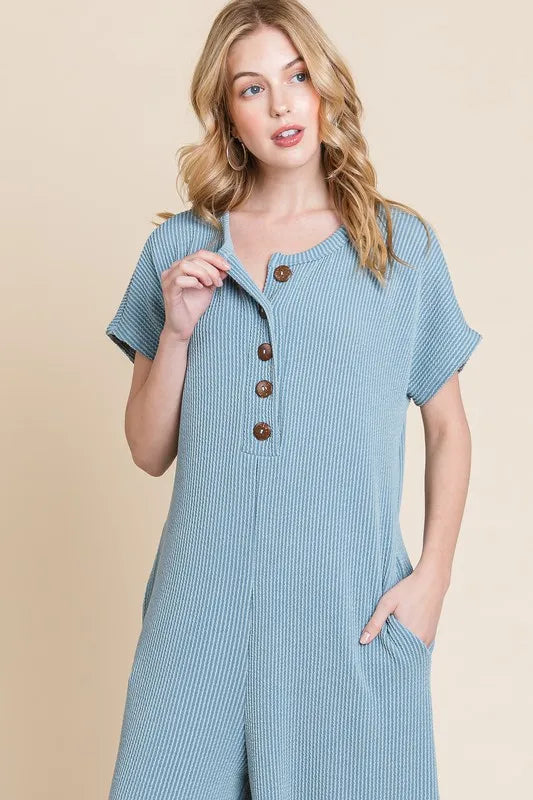Rib Knit Jumpsuit with Button Detail and Pockets.