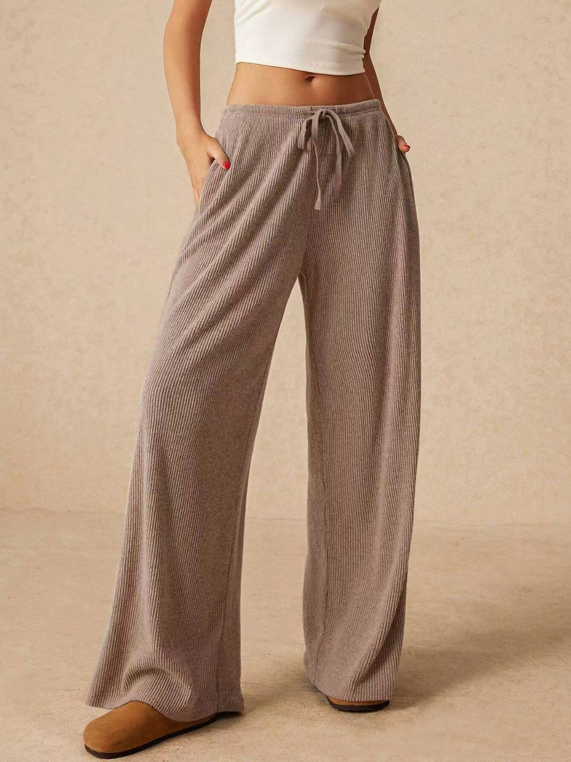Ribbed drawstring wide leg pants with pockets, opaque.