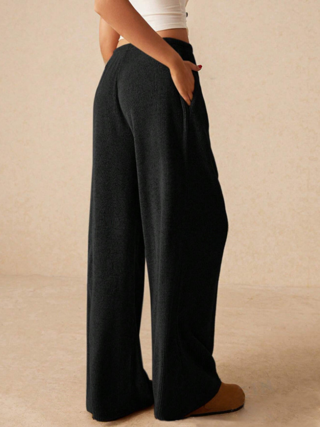 Ribbed drawstring wide leg pants with pockets, opaque.