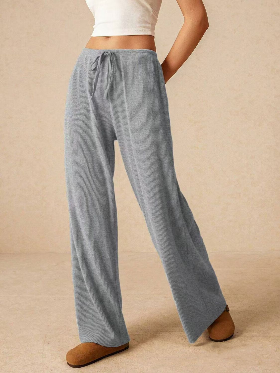 Ribbed drawstring wide leg pants with pockets, opaque.