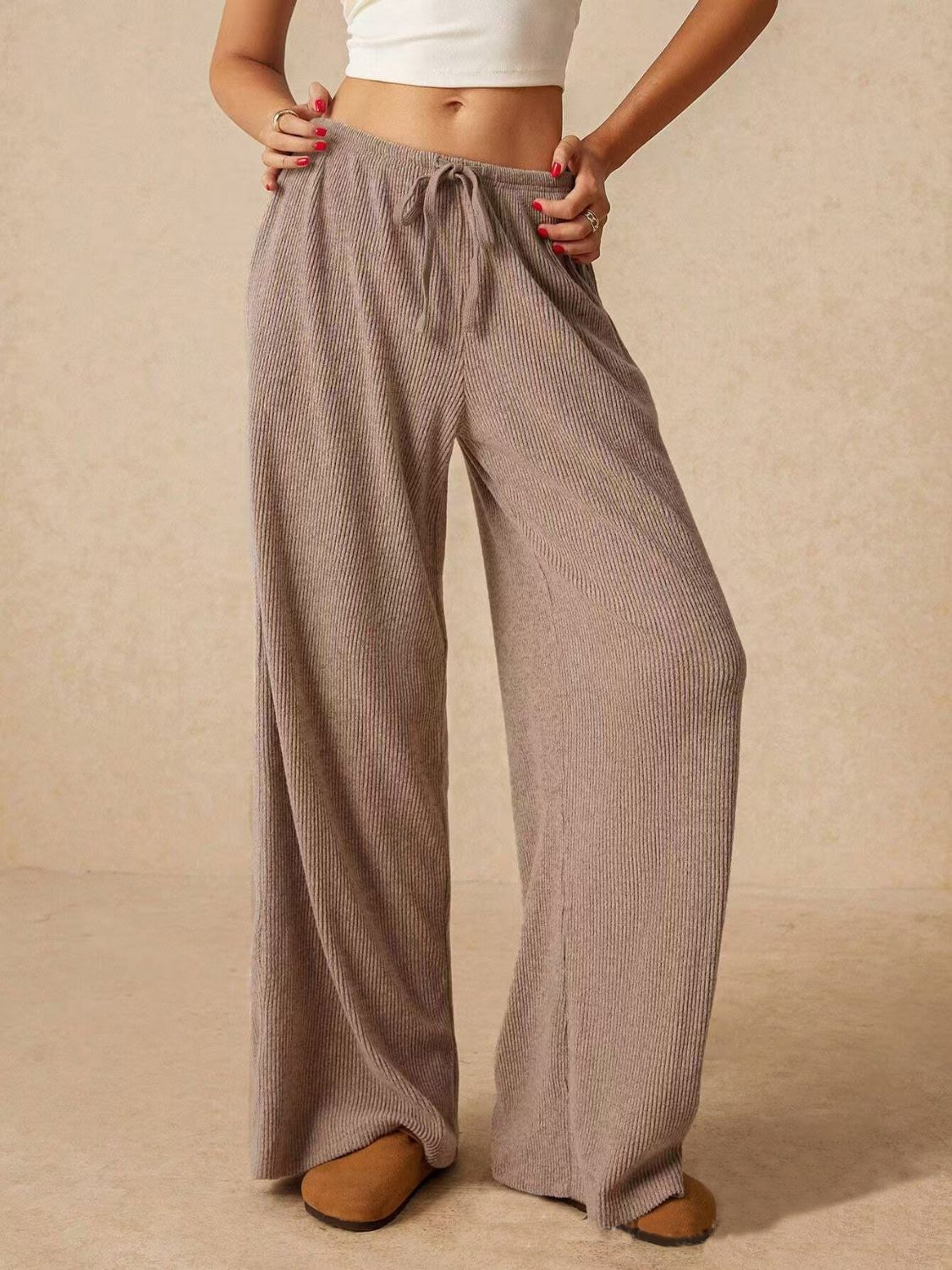 Ribbed drawstring wide leg pants with pockets, opaque.