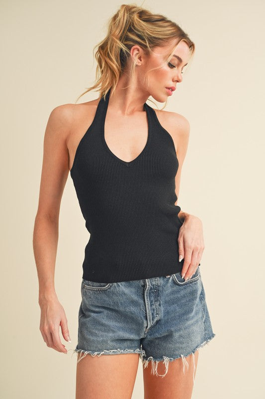 Ribbed halter neck cami, opaque and slightly stretchy.
