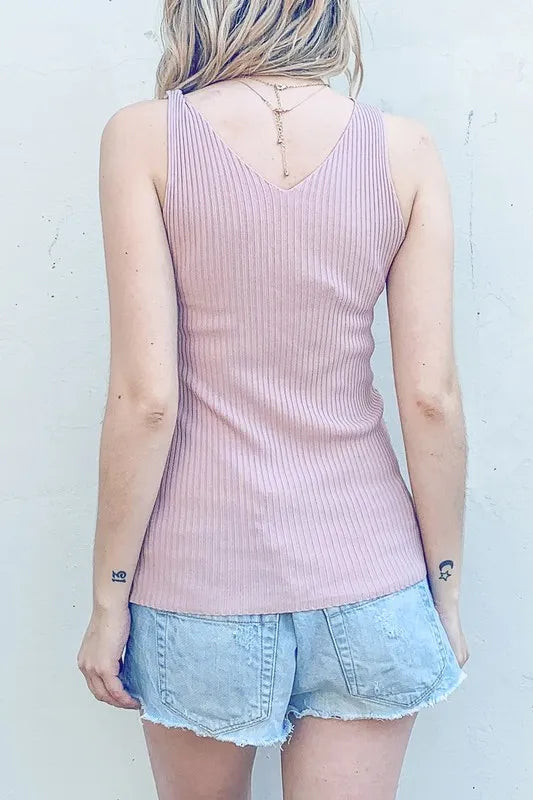Ribbed knit slim tank, moderately stretchy.