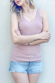 Ribbed knit slim tank, moderately stretchy.