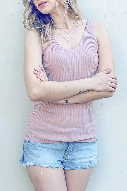Ribbed knit slim tank, moderately stretchy.