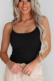 Ribbed scoop neck cami with semi-sheer design.