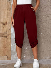 Roll-tab capris pants, oversized.