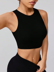 Round neck active tank, opaque and moderately stretchy.
