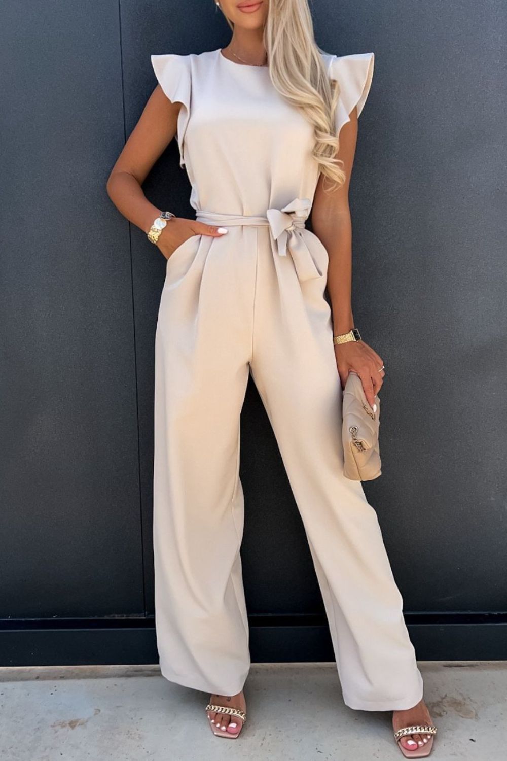 Rib Knit Jumpsuit with Button Detail and Pockets.