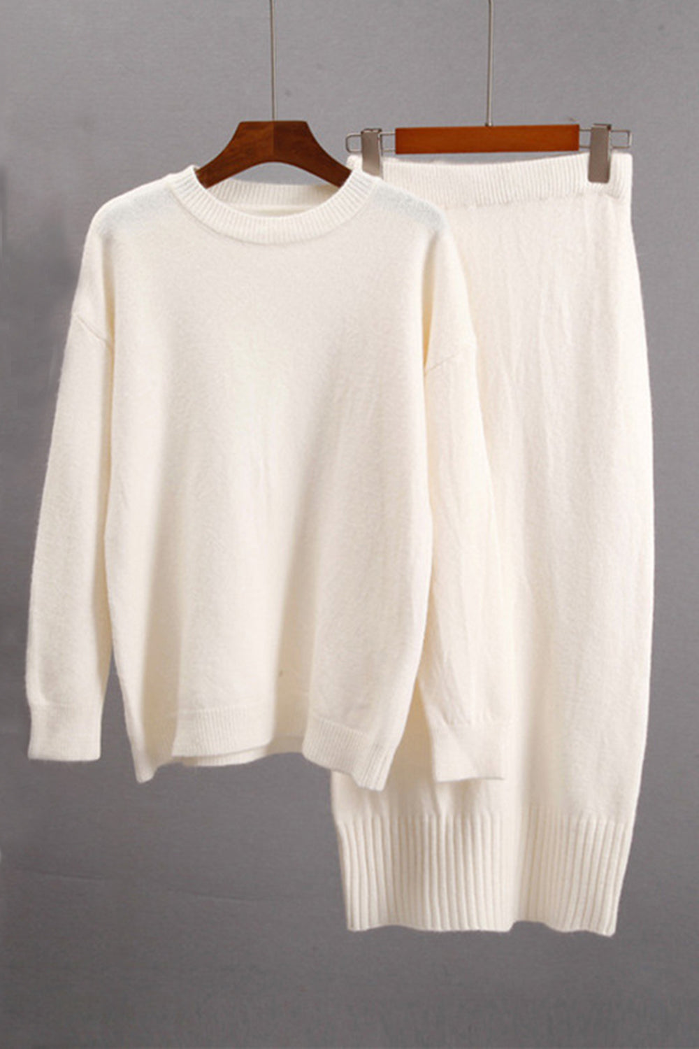 Round Neck Dropped Shoulder Top and Skirt Sweater Set.