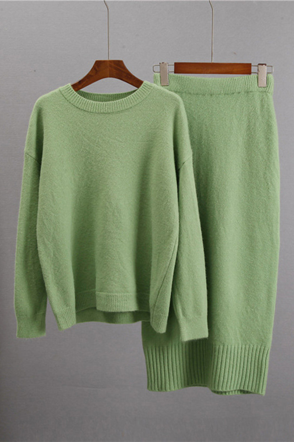 Round Neck Dropped Shoulder Top and Skirt Sweater Set.