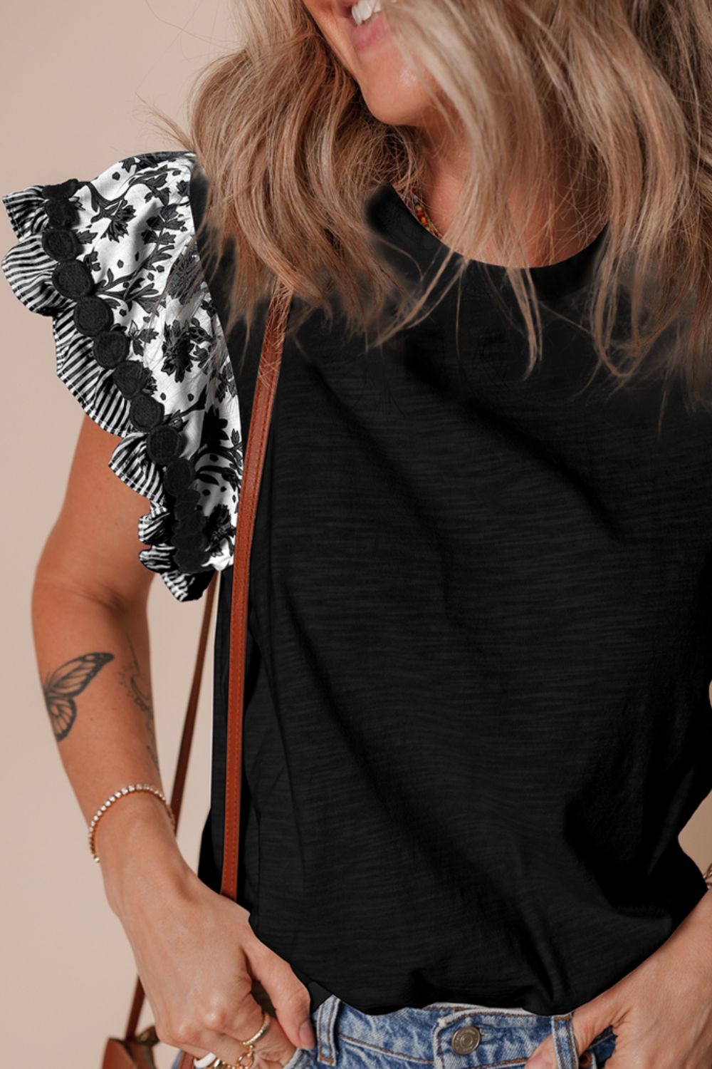 Round Neck Printed Ruffled Cap Sleeve Blouse.