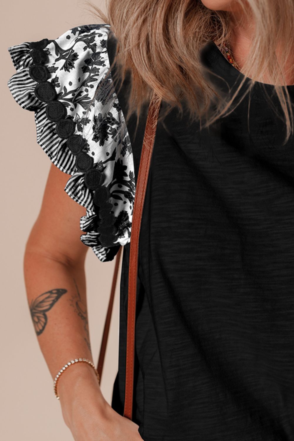 Round Neck Printed Ruffled Cap Sleeve Blouse.