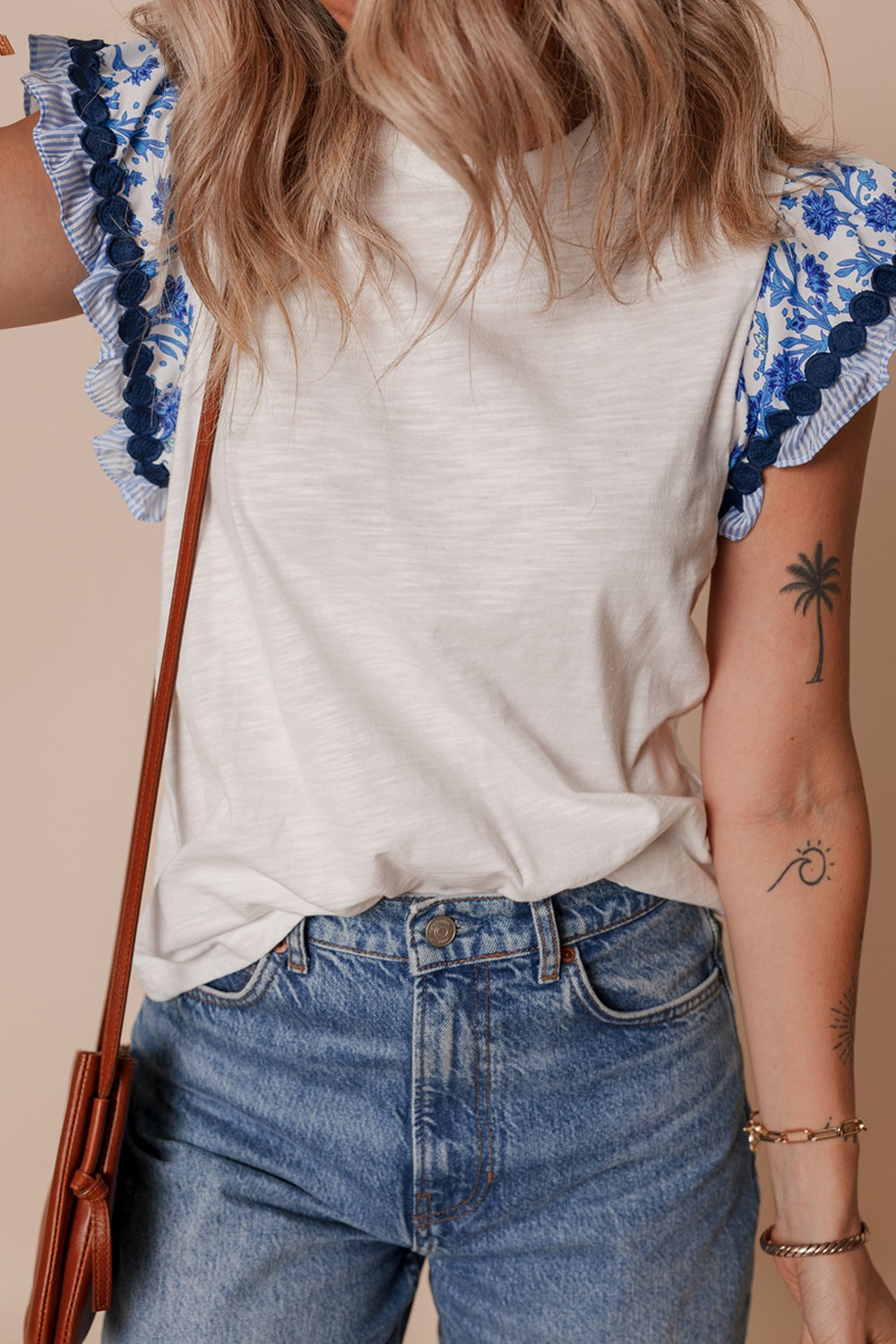 Round Neck Printed Ruffled Cap Sleeve Blouse.