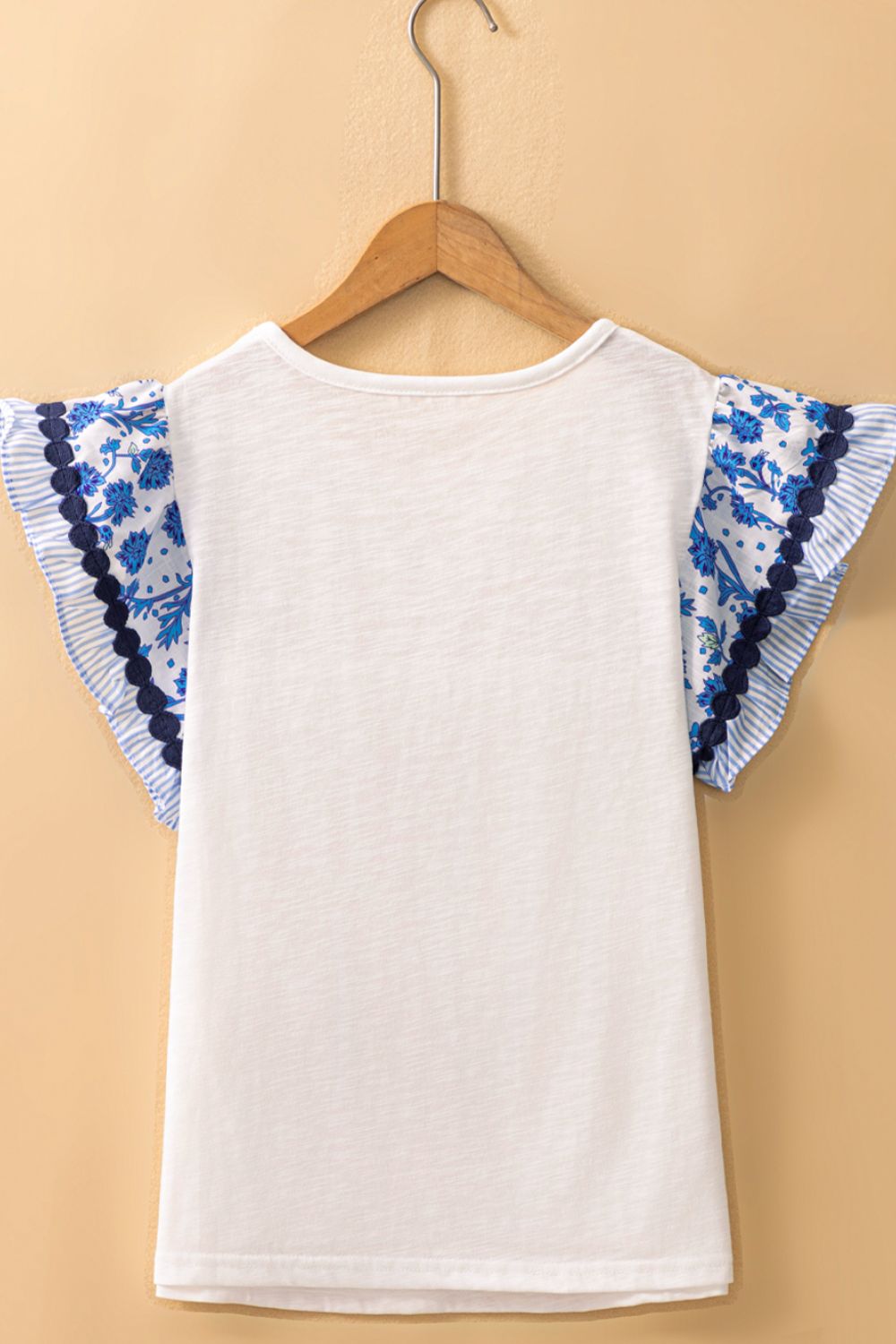 Round Neck Printed Ruffled Cap Sleeve Blouse.